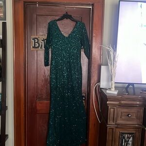 Beautiful green mother of bride/ groom or wedding